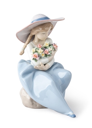 Immagine di BIMBA CON FIORI
