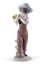 Immagine di BIMBO CON FIORI (ED. 60 ANNIVERSARIO)